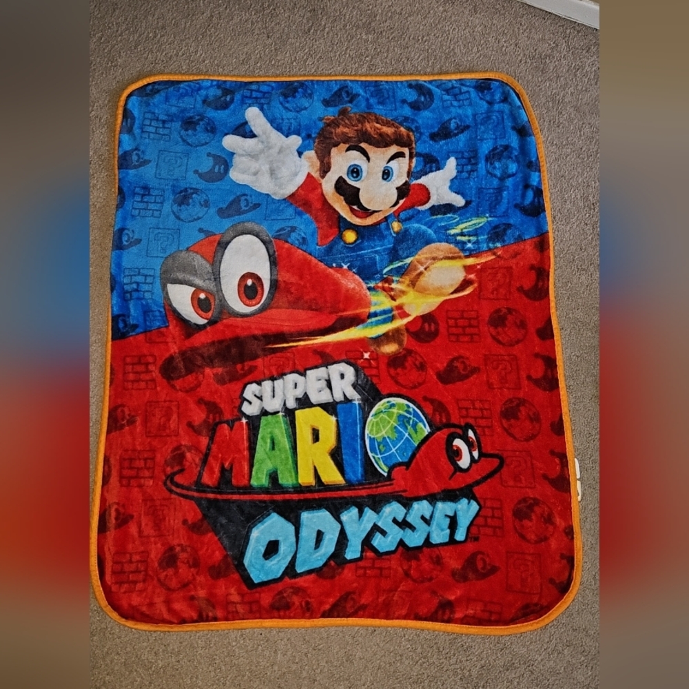 Nintendo Mario Odyssey Red and Blue Blanket with Vibrant Design